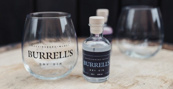 Burrell's London Dry Gin alongside a stemless balloon glass