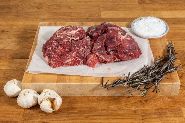 Diced Beef On Wooden Board