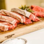 Lincoln Red Beef Steaks on Wooden Chopping Board