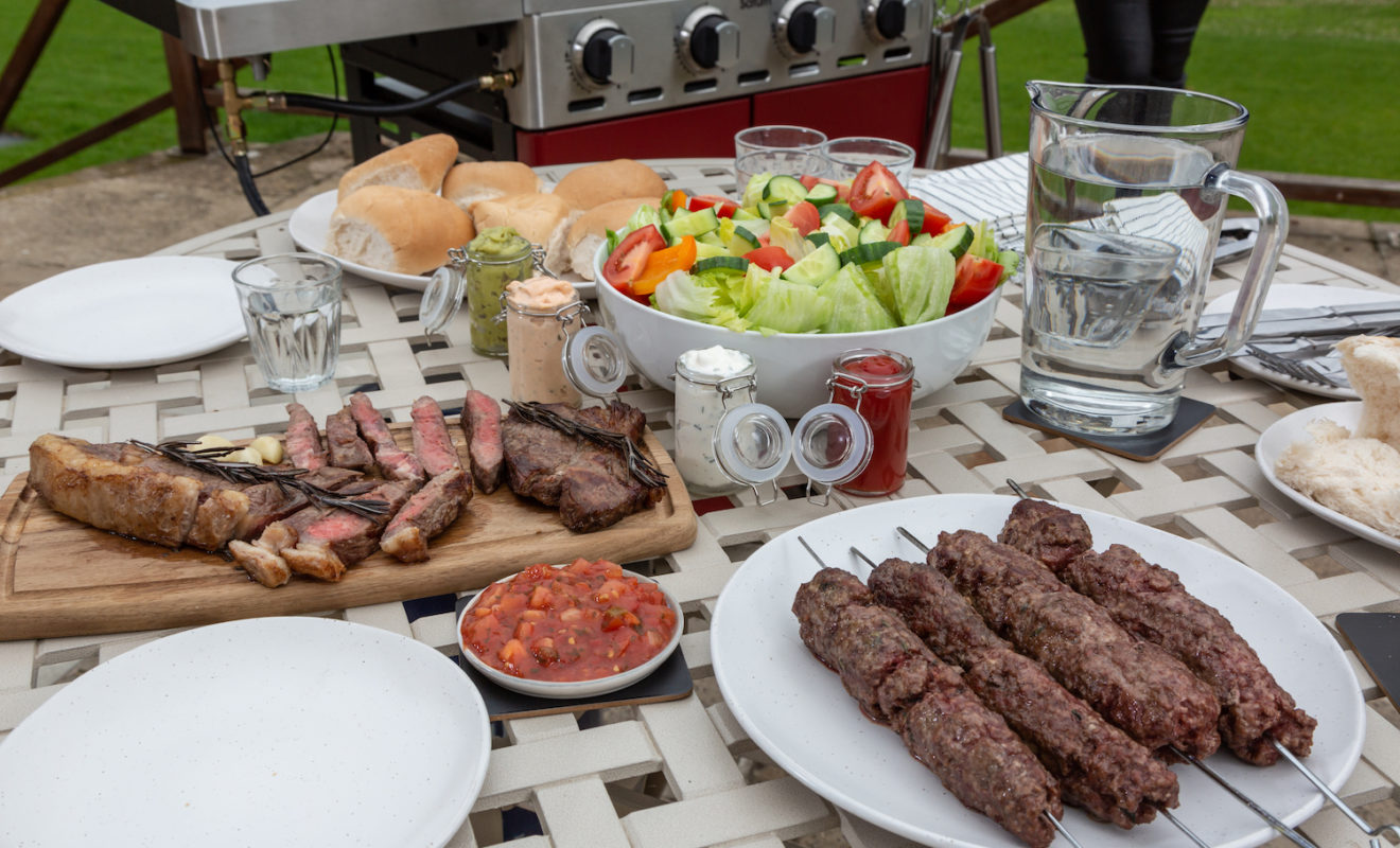 A BBQ of Lincoln Red Beef Steaks and Koftas