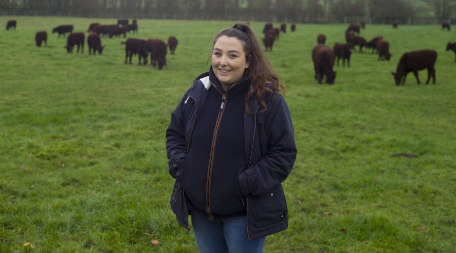 Keira Rhodes with the Lincoln Red Herd