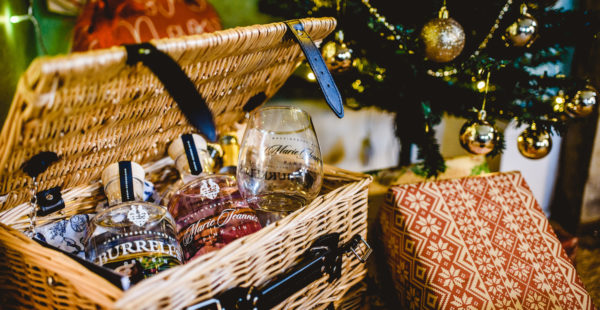 Gin Lovers Hamper under a Christmas Tree with presents