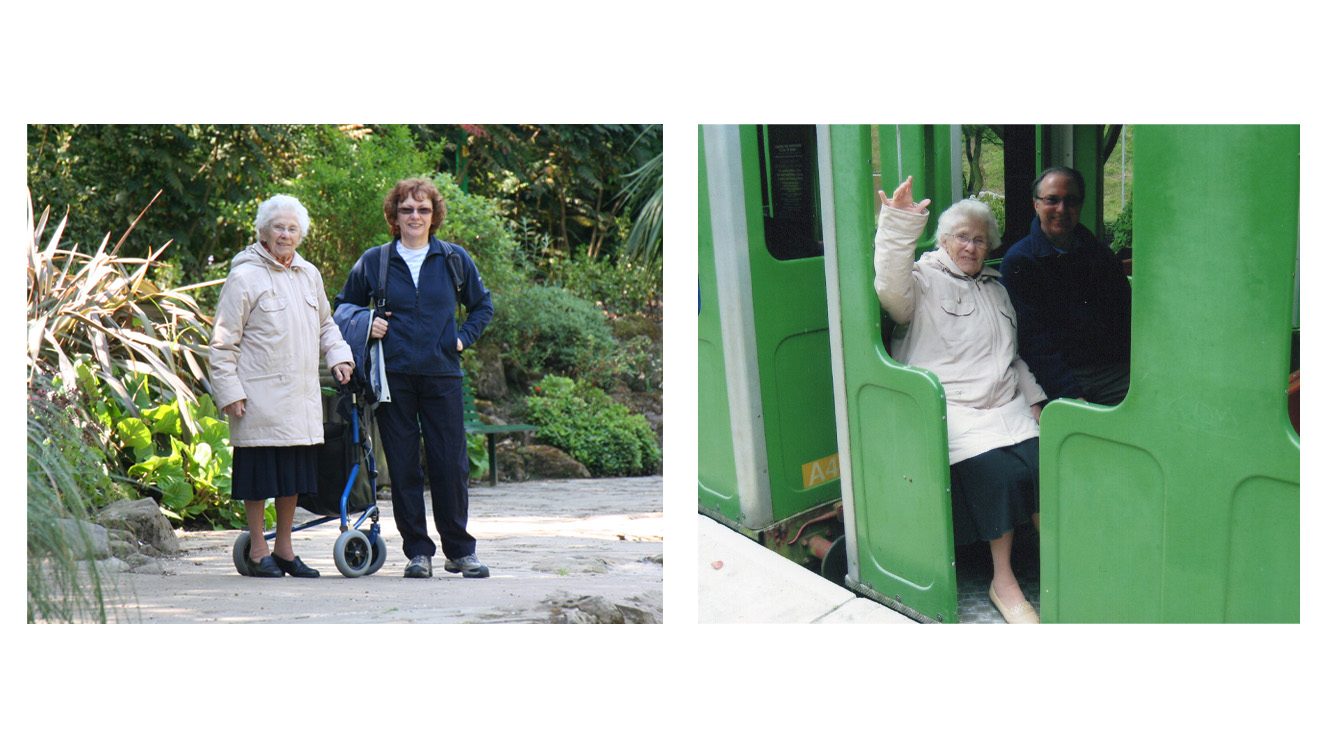 An elderly women going on a train