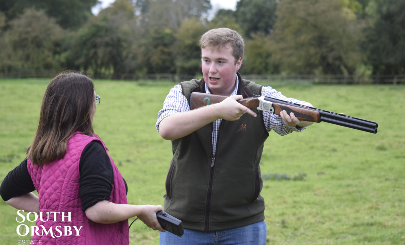 Person Holding Gun