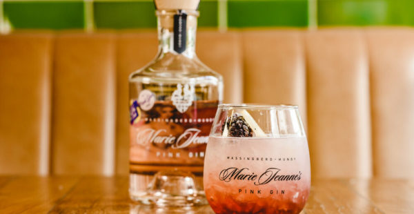 Marie Jeannes pink gin with the glass