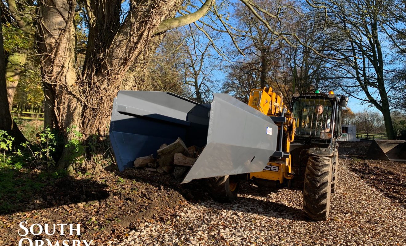 Forklift carrying timber